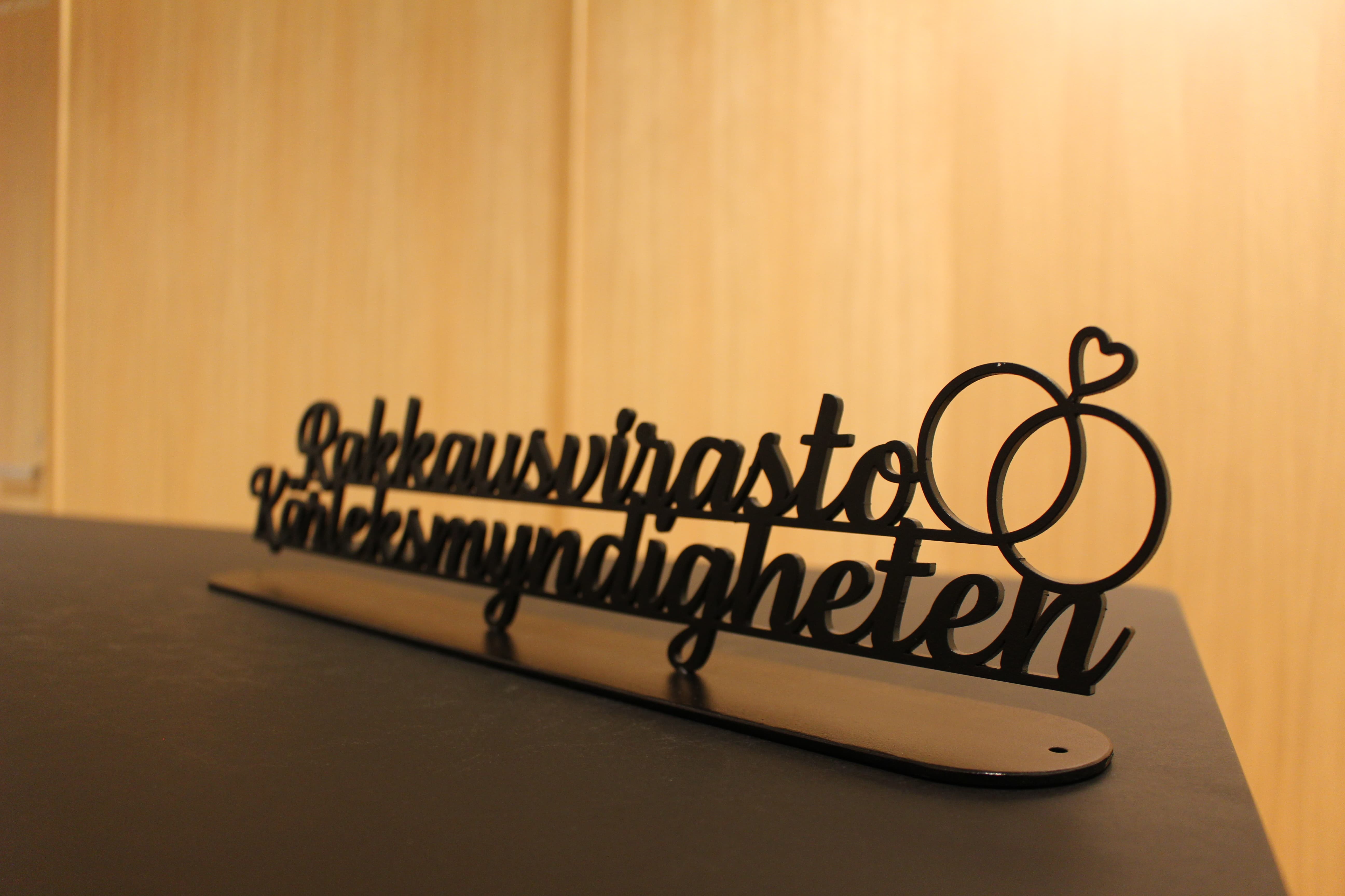 A sign that reads ‘Love agency’.