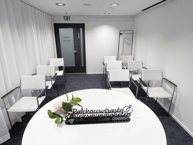 Marriage ceremony premise, white curtains.