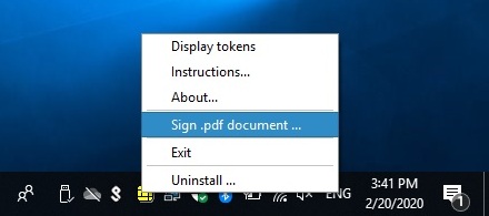 The DigiSign Client icon is in the task bar. “Sign .pdf document” has been selected from the menu.